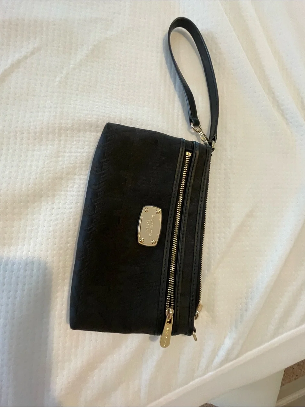 Michael Kors Black Wristlet with Gold-Tone Logo Plate